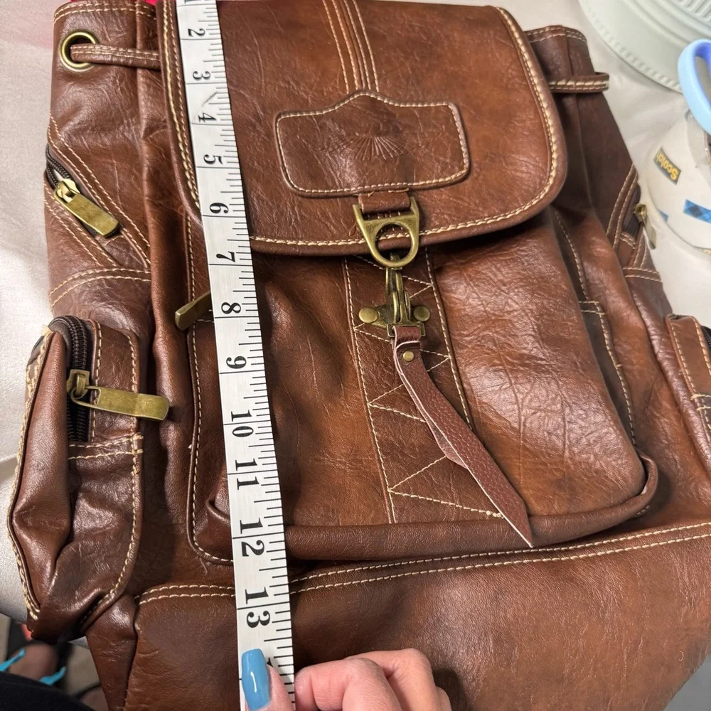 Brown Leather Backpack with Gold Accents